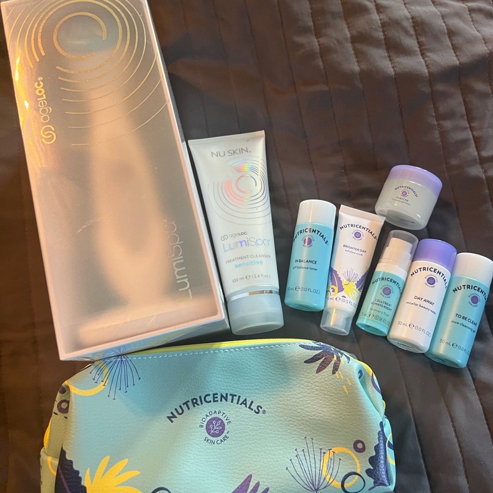 Nuskin LumiSpa with sensitive cleanser, travel size skin care set